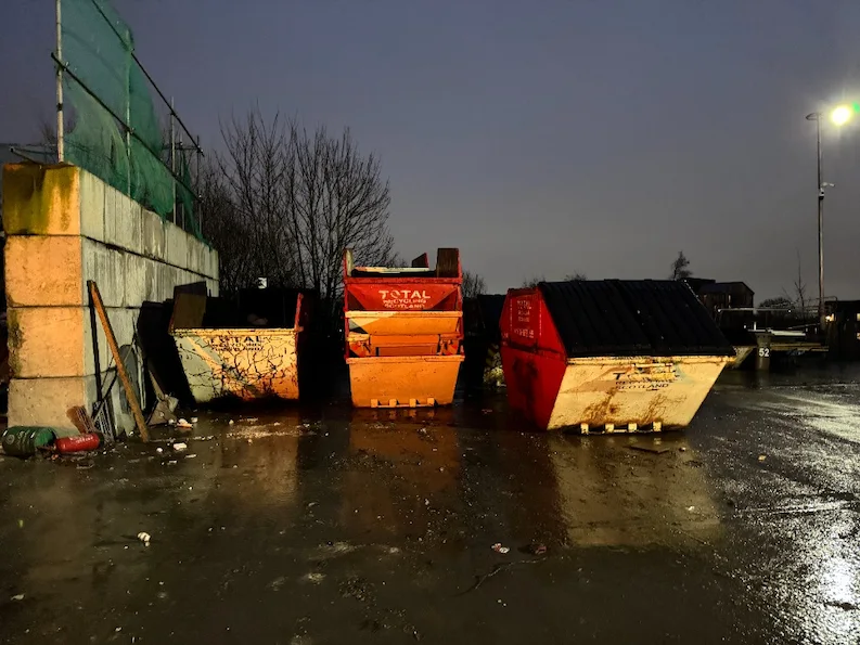 Total Recycling Scotland skips at night at Bathgate facility